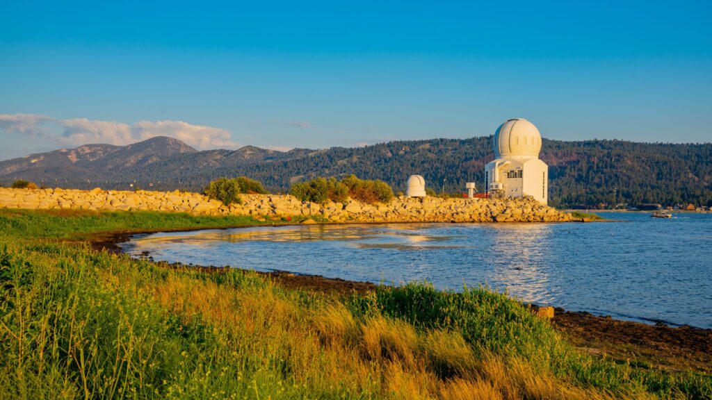 Big bear observatory with big bear lake in foreground for travel guide website Big Bear Waypoint