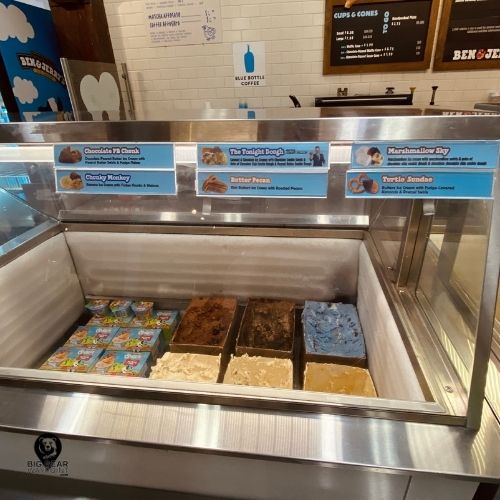 Ice cream counter at Ben and Jerry’s Big Bear featuring flavors like The Tonight Dough, Marshmallow Sky, and Chunky Monkey.