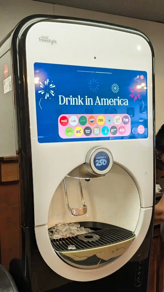 Coca-Cola Freestyle beverage machine offering dozens of customizable soft drink options at Maggio's Pizza Big Bear.